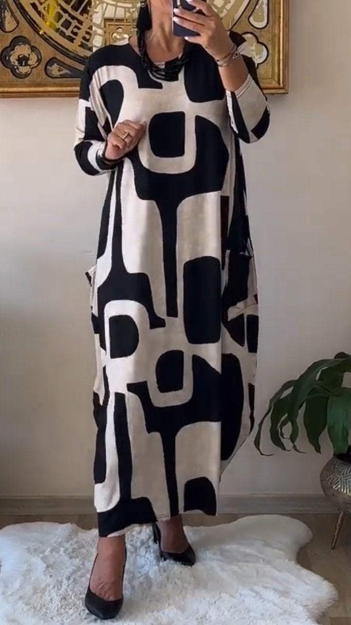 Behagelig langærmet kjole med rund hals og print